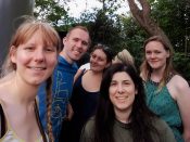 Kim, Greg, Lauren, Laura and Lucy standing in a queue line taking a selfie.
