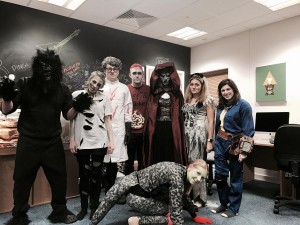 Everyone in their Halloween costumes; costumes include a wolf dressed as Little Red Riding Hood, a ghost bride, a mad scientist and Gerard the bearded dragon